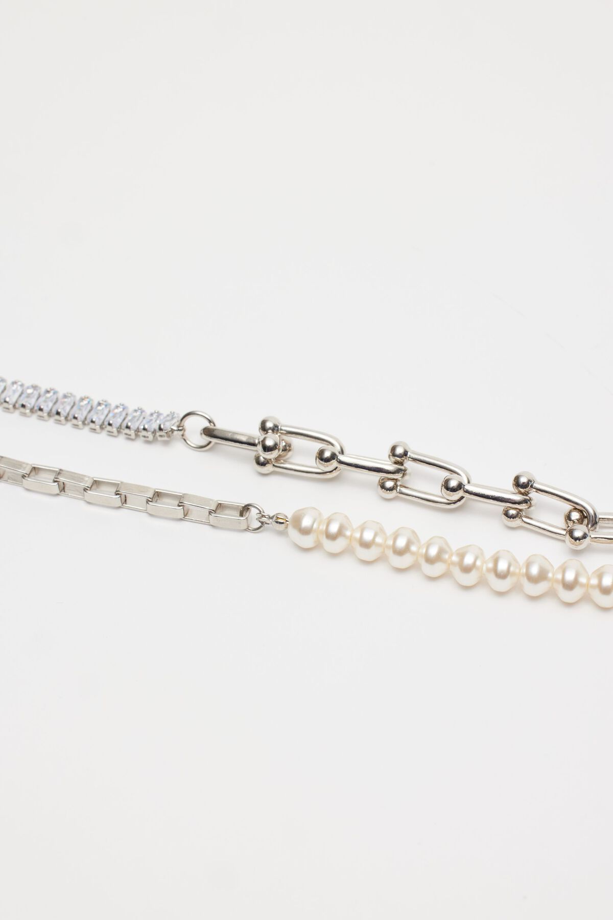 Dynamite Layered Pearls & Baguette Bracelet. 4