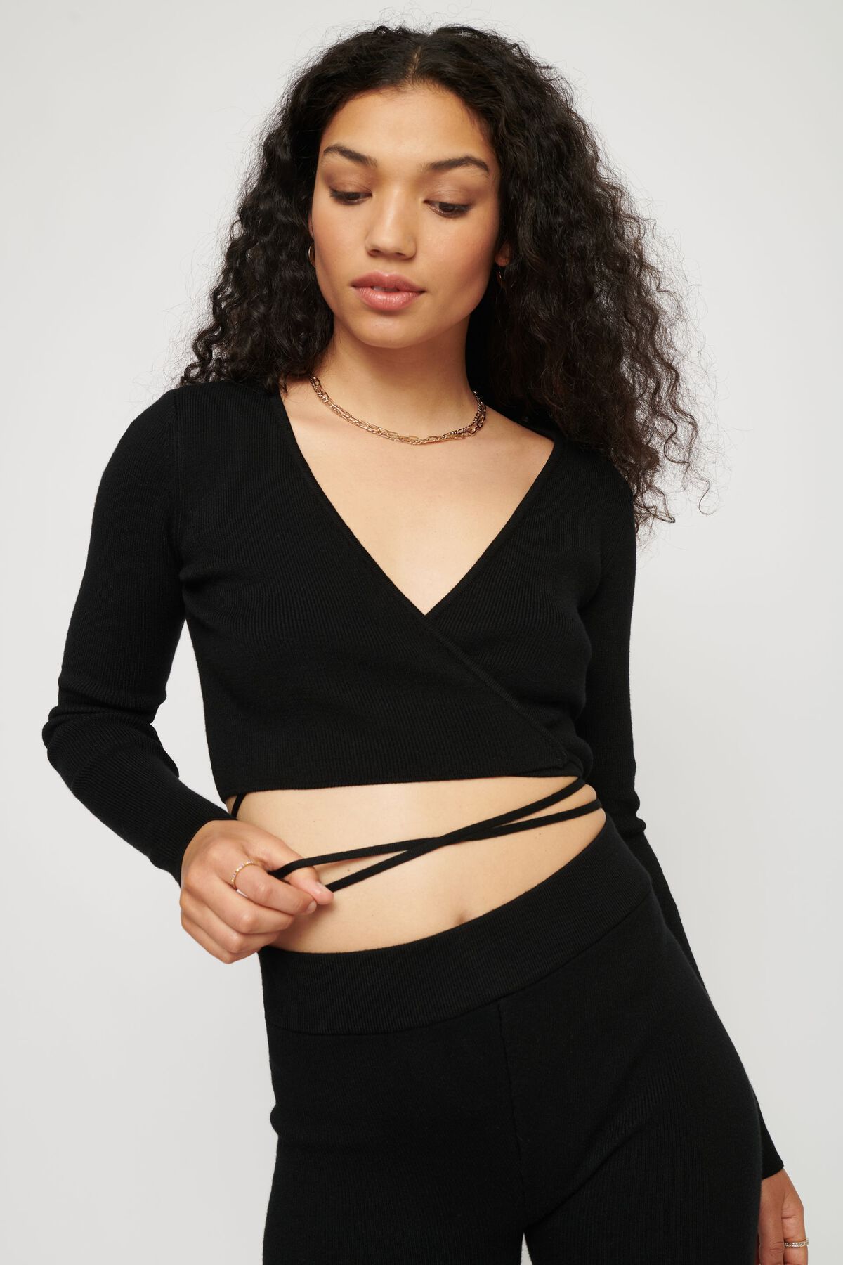Dynamite Long Sleeve Wrap Crop Top. 1
