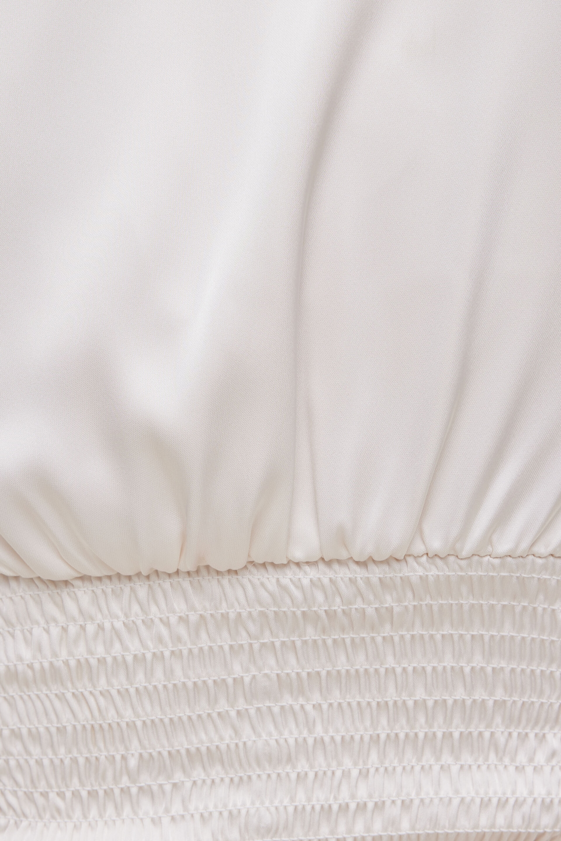 Blouse drapée en satin à col V