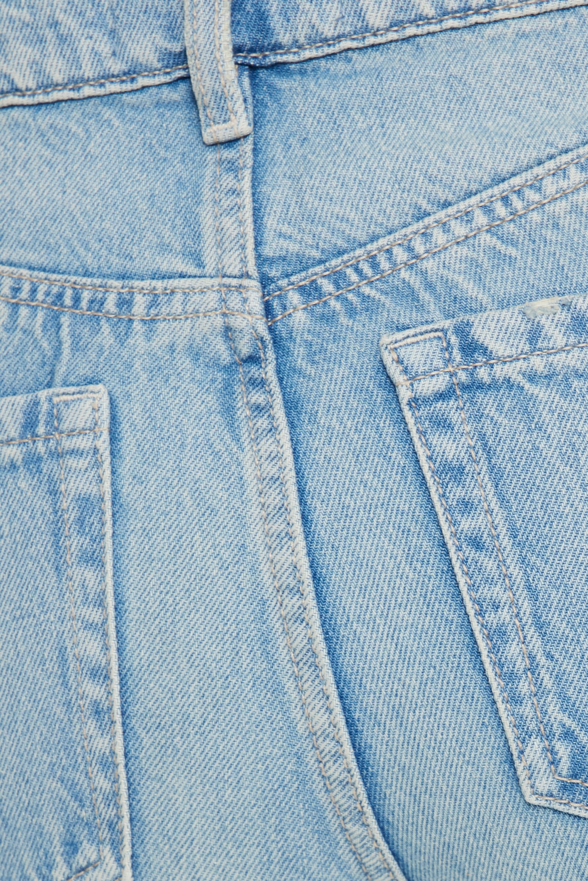 Jean Heidi à taille haute et jambe large