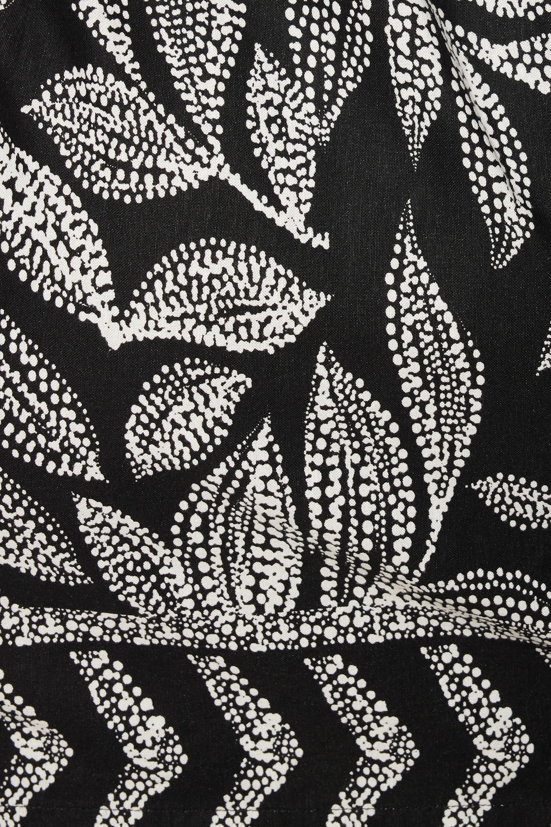 Minirobe à manches bouffantes et à devant torsadé Paloma