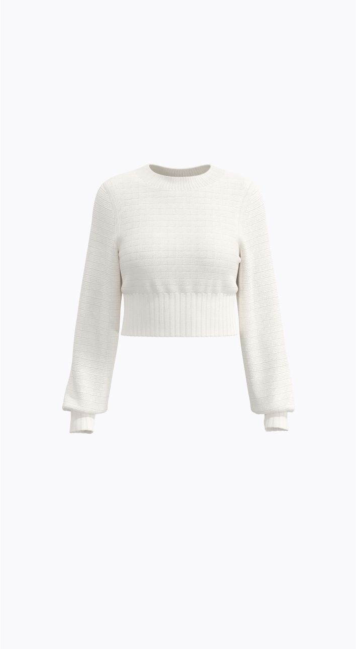 A beige cable knit sweater