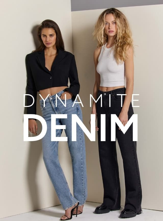 One model wears blue straight leg jeanns with a cropped black blazer and the other model wears black wide leg jeans with a white tank top.