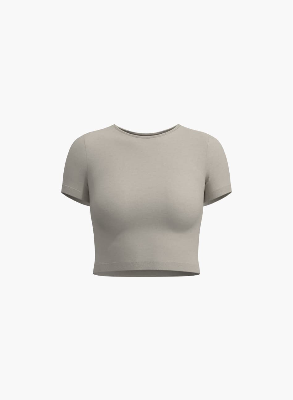 A beige cropped t-shirt.