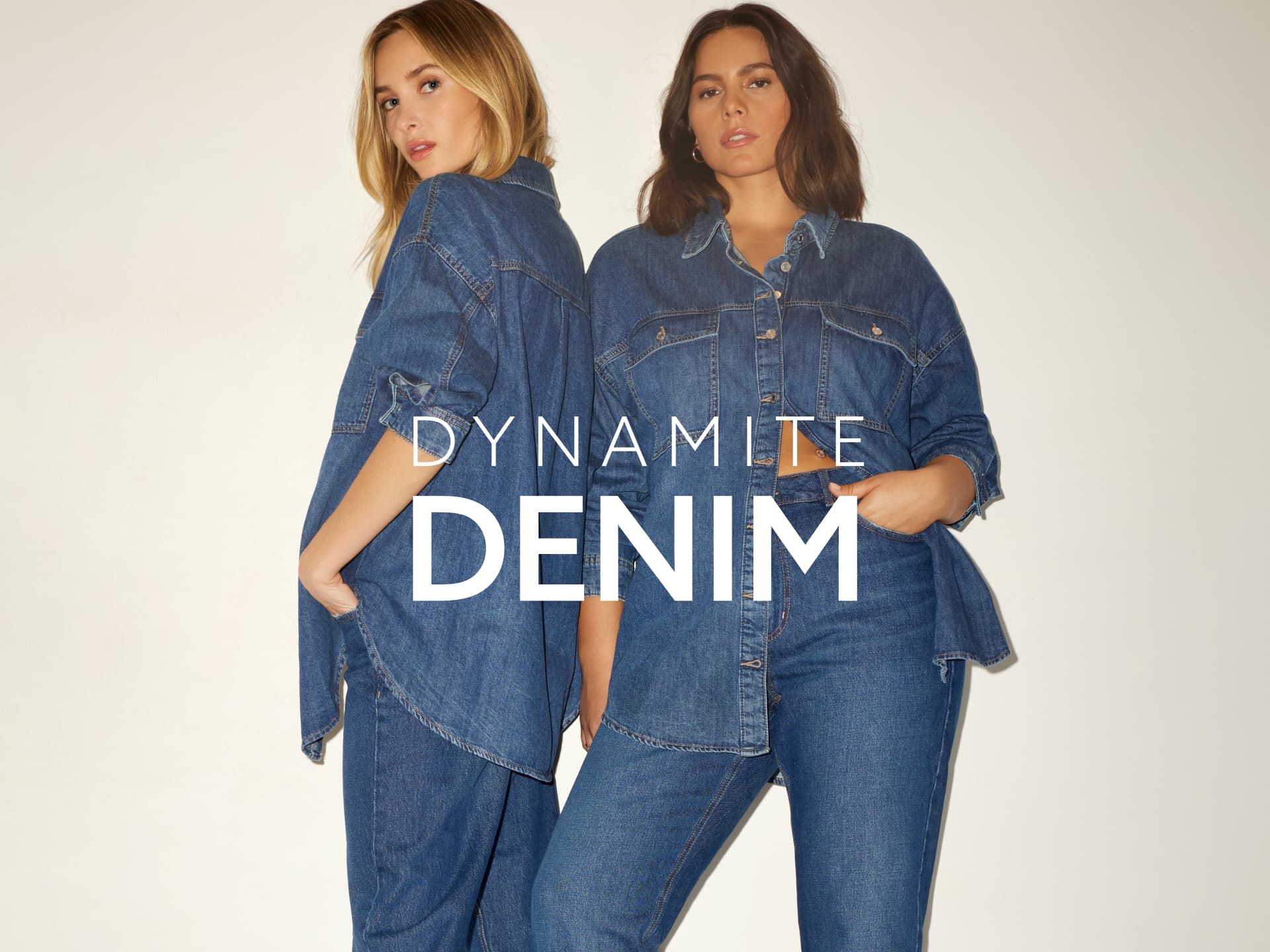 Two models wear dark blue jeans with a black denim button down shirt.