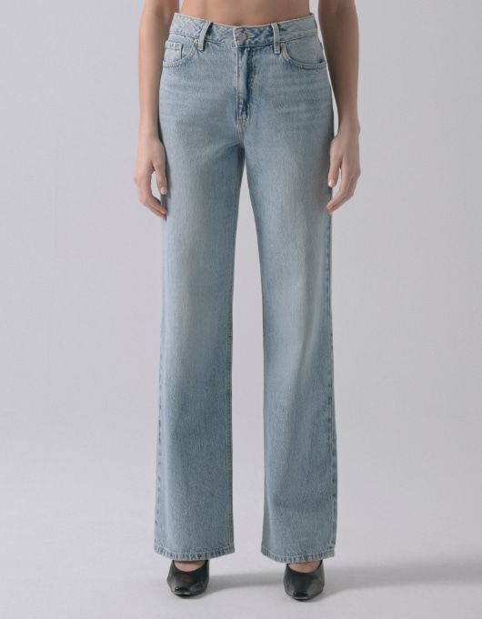 A model wears the Heidi jeans.