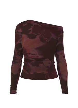 Haut fleuri à épaule dénudée.