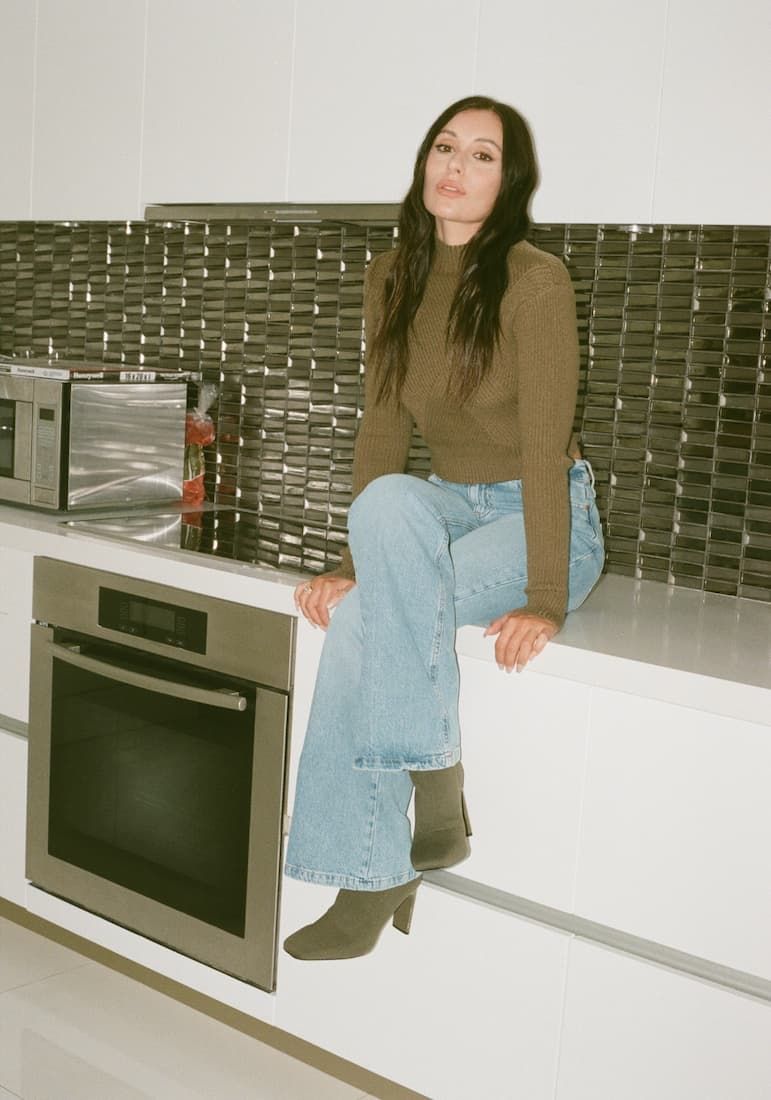 Marta sitting on kitchen counter.