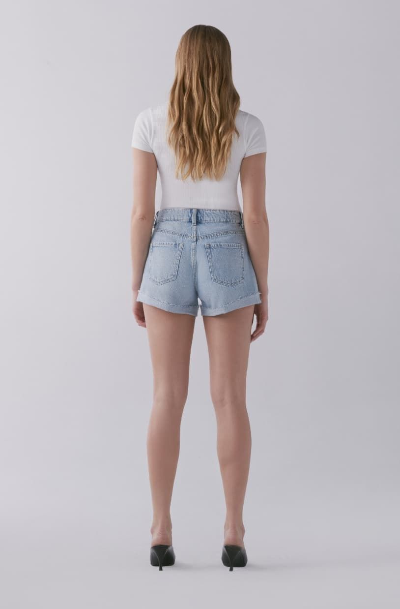 A model wears the Claudia mom shorts.