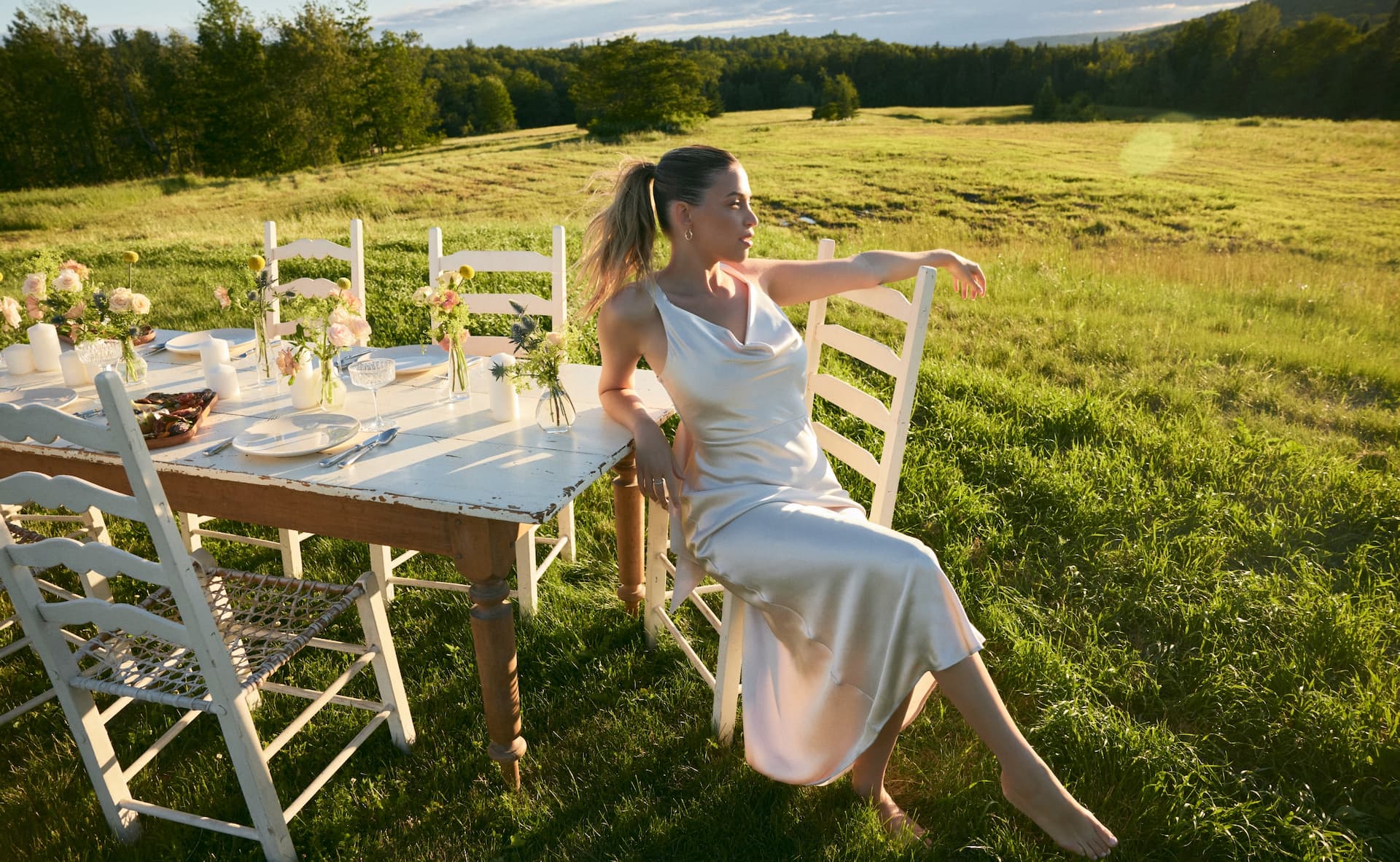 Nitsan wears the maxi satin slip dress.