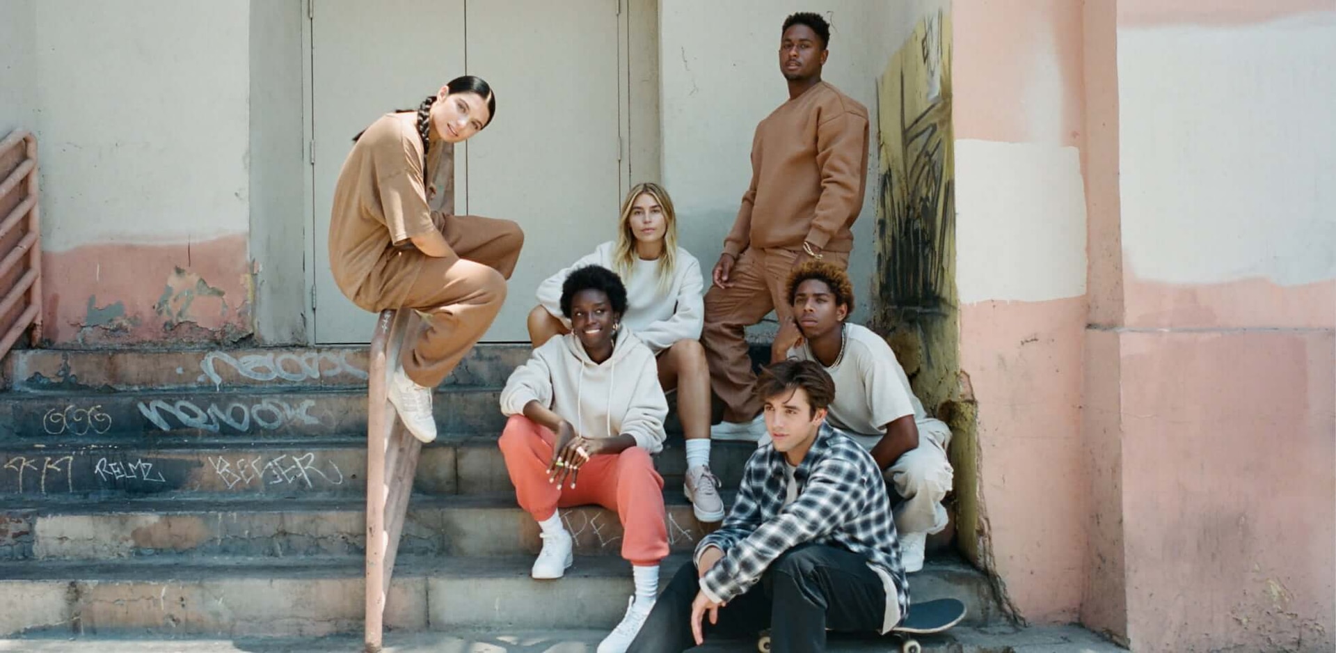 Models are wearing Garage unisex clothing.