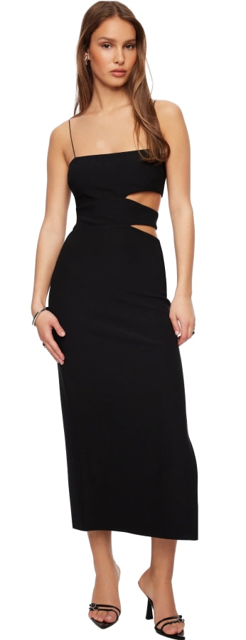 Model is wearing a black cutout maxi dress.