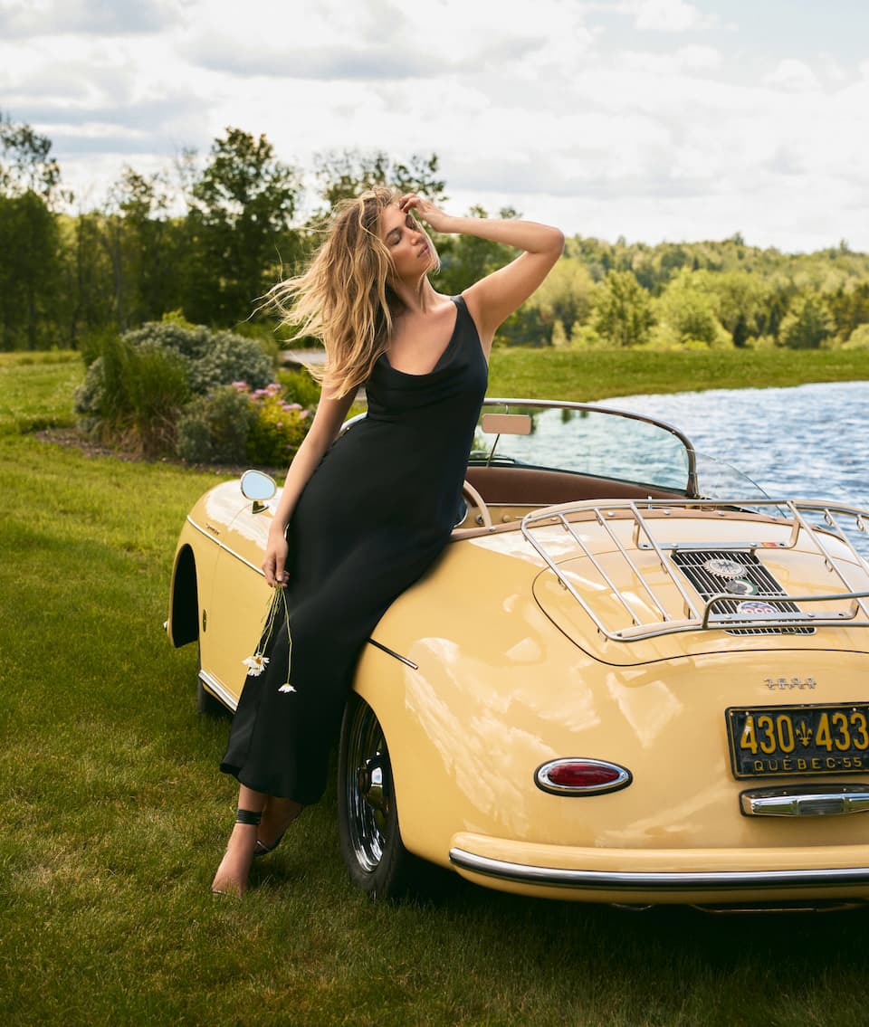 Nitsan wears the maxi satin slip dress.